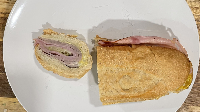 Cross section cut of Cuban sandwich on a plate