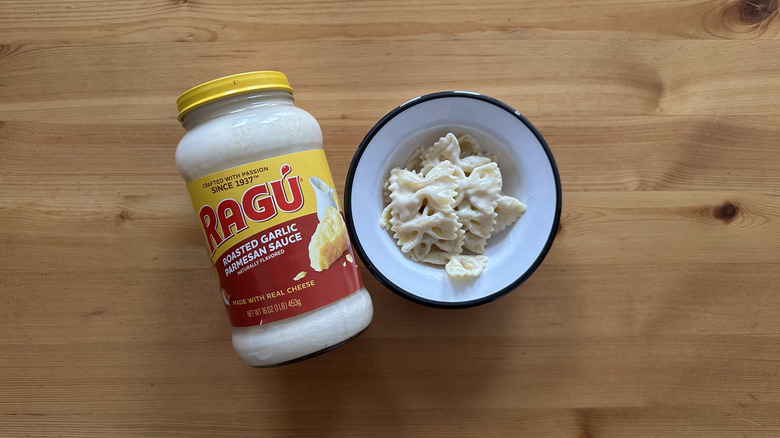 Roasted Garlic Parmesan Sauce with pasta in white bowl
