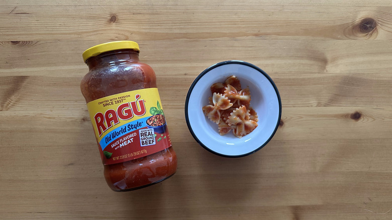 Old World Style Sauce Flavored with Meat with pasta in white bowl