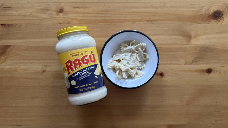 Classic Alfredo Sauce with pasta in white bowl