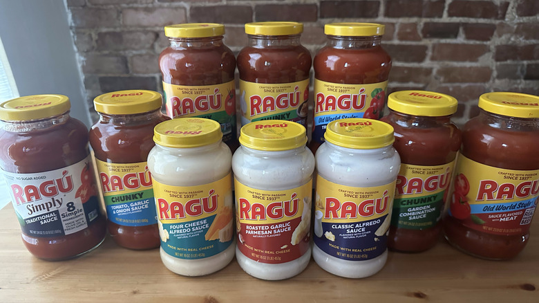 Ragu pasta sauce jars on wooden table