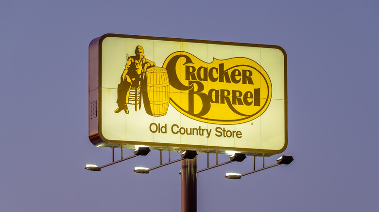 A lit-up billboard with the Cracker Barrel logo