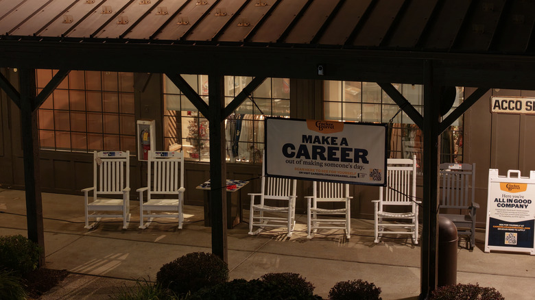 Empty rocking chairs outside a Cracker Barrel