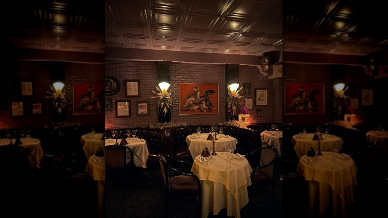 A view of an empty street outside La Dolce Vita in Beverly Hills, California at night