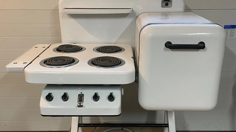 White vintage Electrochef against white tiled wall