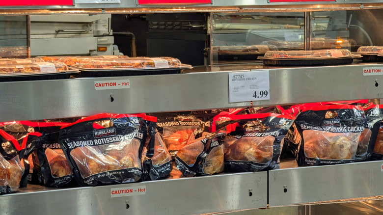 Kirkland Signature rotisserie chickens in heated area