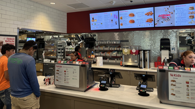 Customers order at the counter inside Chick-fil-A