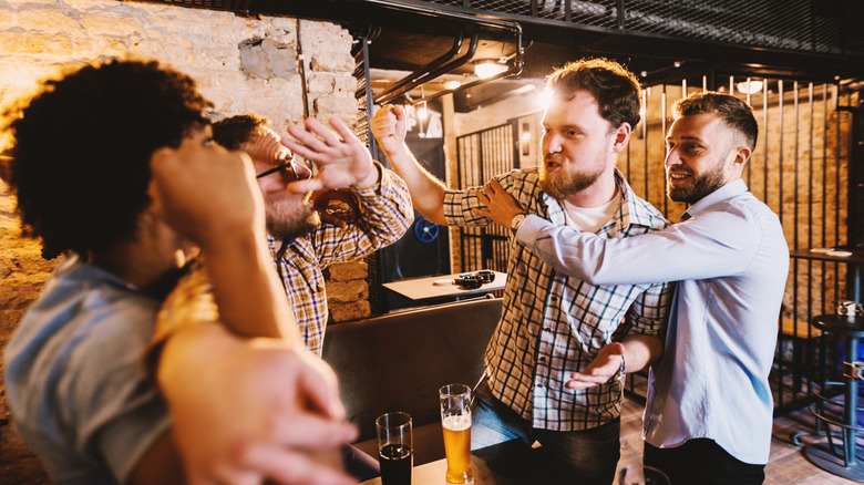 People getting ready to bar fight