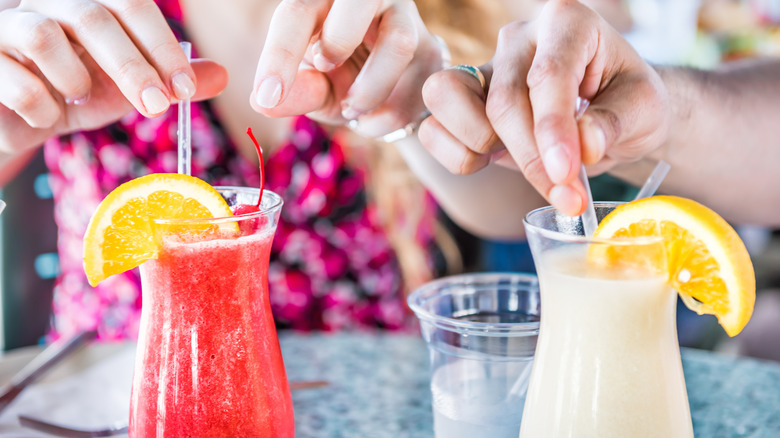 Closeup of a straberry daquiri and pina colada
