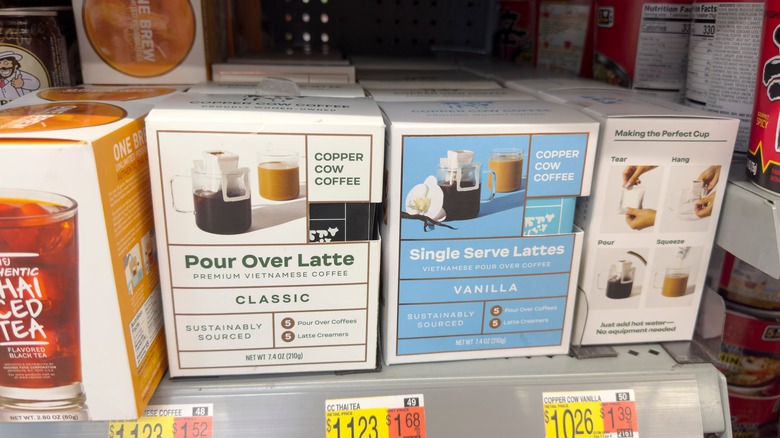 Several packages of Copper Cow Coffee on display at a store