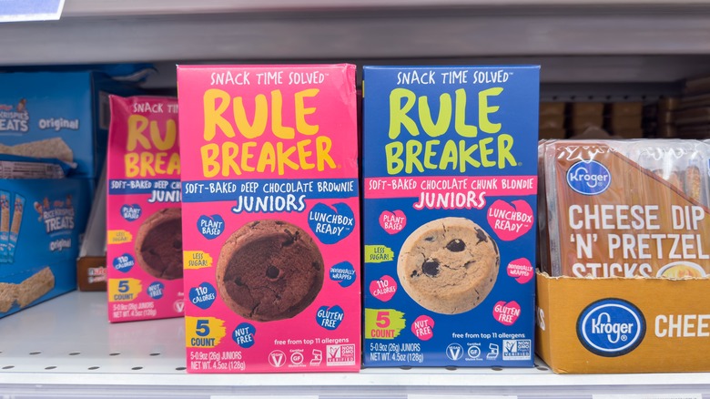 Several packages of Rule Breaker cookies on display at a store