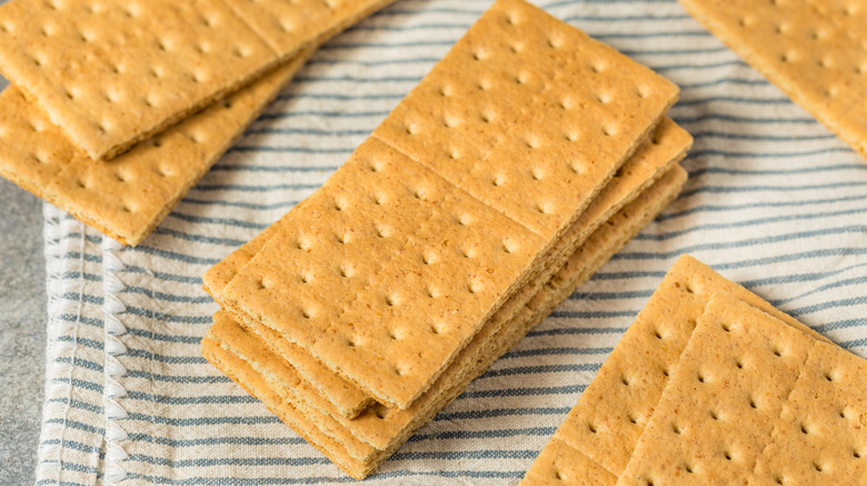 Piles of Graham crackers on striped cloth