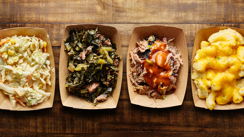 carboard plates filled with barbecue sides