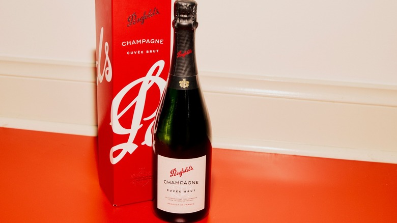 bottle and red box of champagne