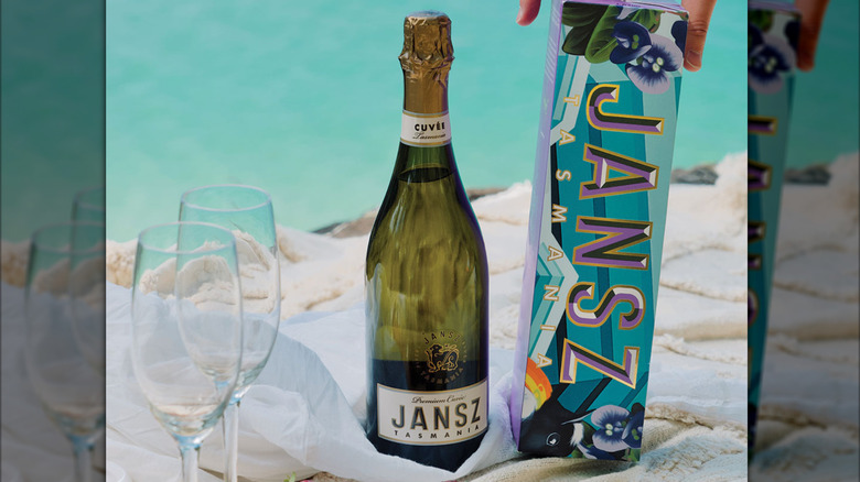 bottle of sparkling wine with decorative box