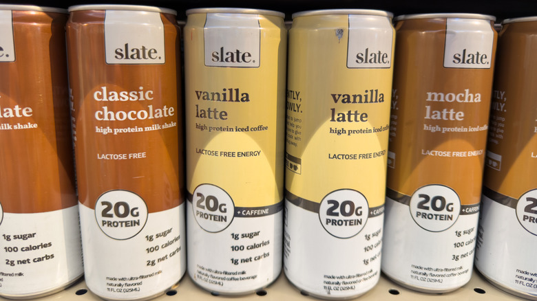 Canned coffee products on grocery store shelf