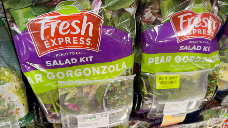Fresh Express salad kits on grocery store shelf