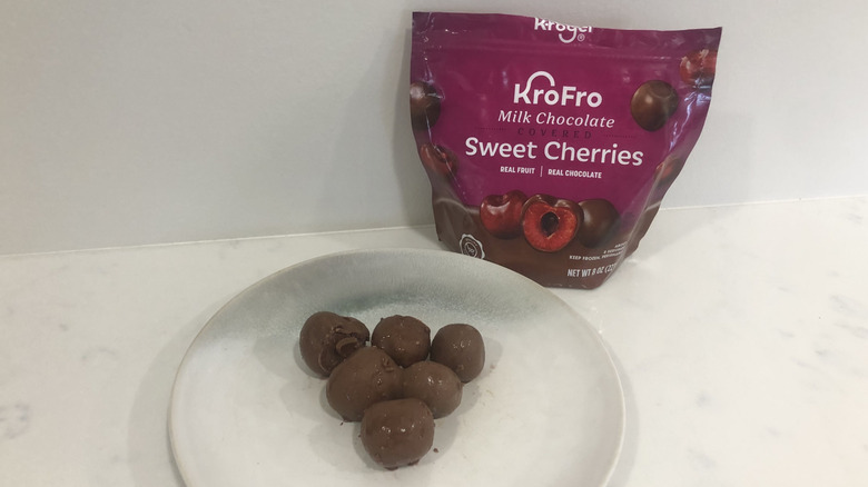 KroFro Milk Chocolate Covered Sweet Cherries on a plate.