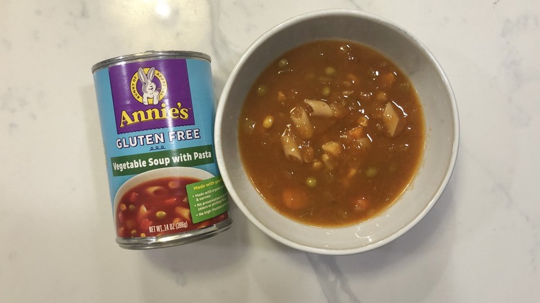 Annie's vegetable soup with pasta in a bowl.