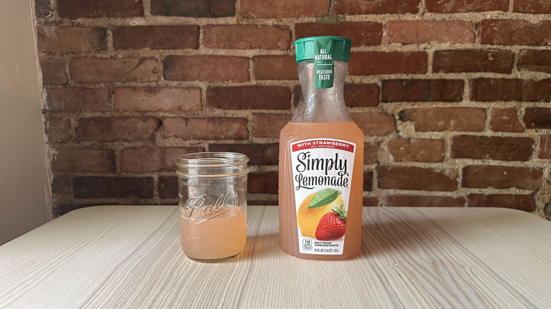 Simply Lemonade with Strawberry with brick background