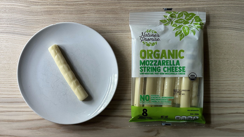 Nature's Promise string cheese on wooden table