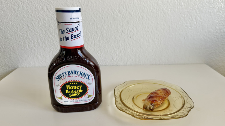 Honey Barbecue Sauce bottle with chicken wing