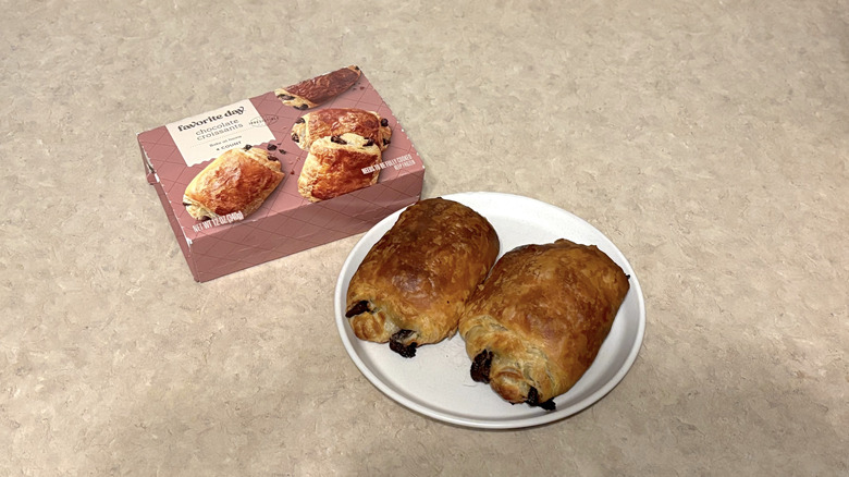 Favorite Day chocolate croissants on white plate and box on neutral background