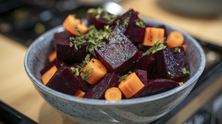 Bowl of roasted carrots and beets in cubes