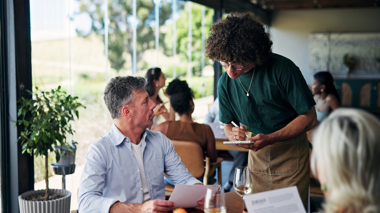 Server talking with a customer