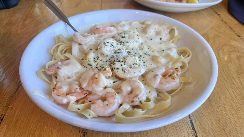 Shrimp alfredo pasta in a dish