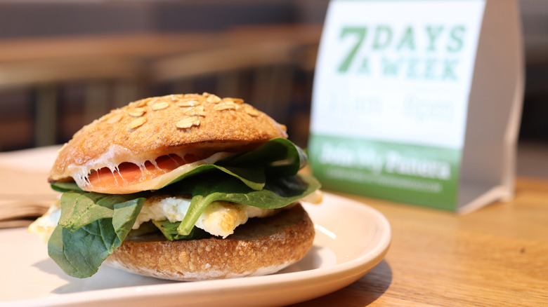 sandwich on a table at Panera with table standee in blurred background