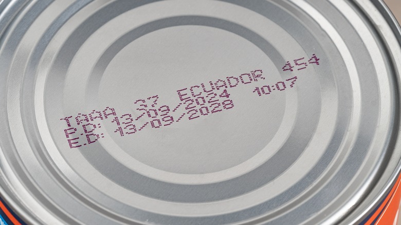 Close-up of 2028 expiration date on canned food