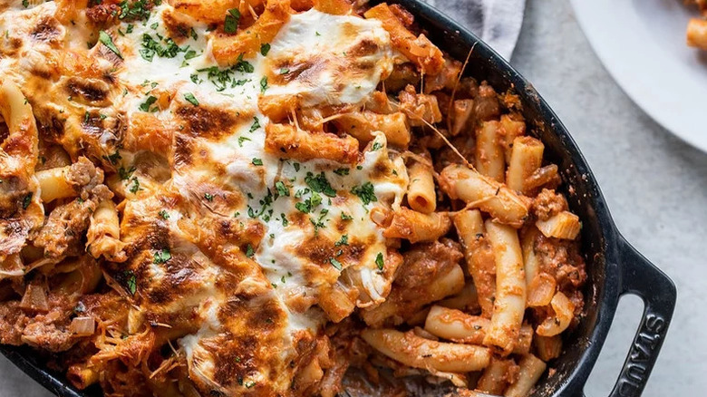 Classic baked ziti in cast iron baking pan