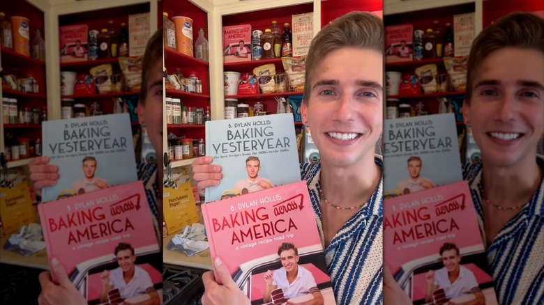 B. Dylan Hollis posing with his cookbooks