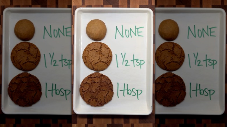three different ginger snap cookies on a tray with labels next to them