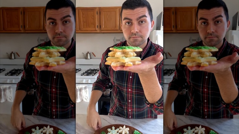 Easy Gay Oven piling Christmas cookies onto his hand