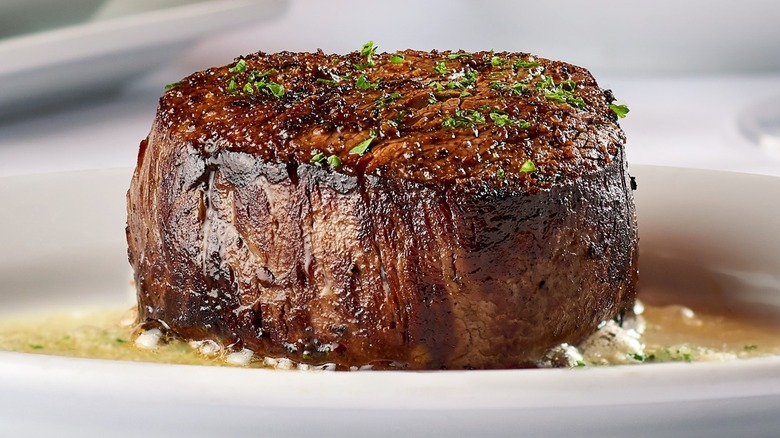 Small steak on white plate at Ruth's Chris Steakhouse