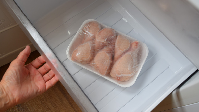Thawing chicken going into the refrigerator