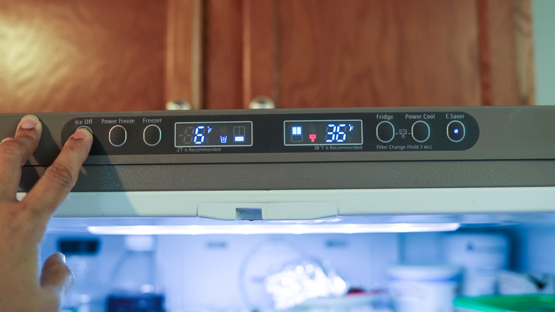 Close up of refrigerator thermometer below 40 degrees