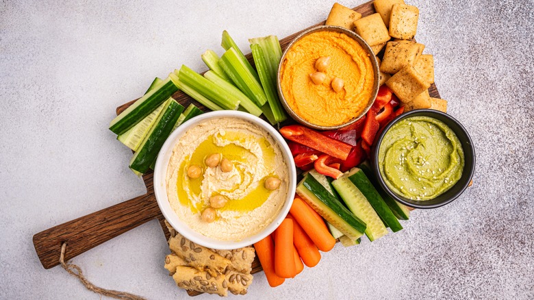 Snack plate with fruits, veggies, and dips