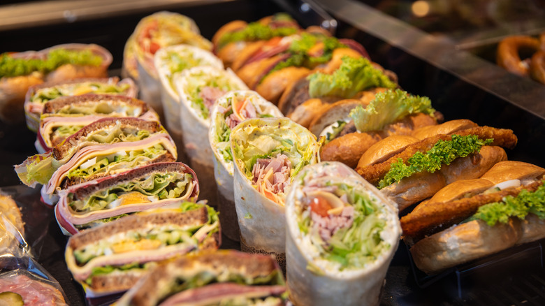 Various sandwiches and wraps displayed in shop