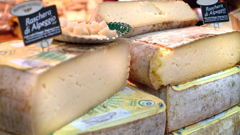 Stacks of raschera at market