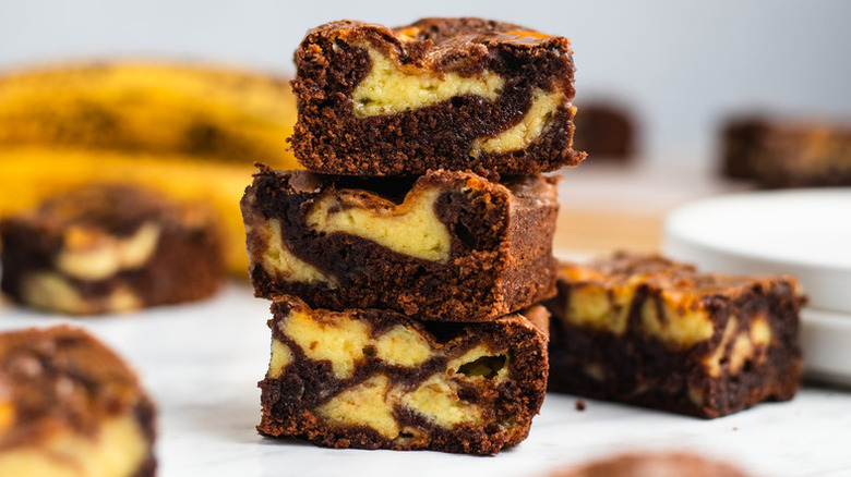 Stack of chocolate brownies swirled with banana pudding
