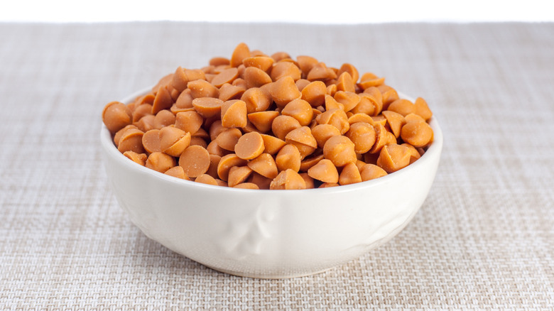 Butterscotch chips in white bowl