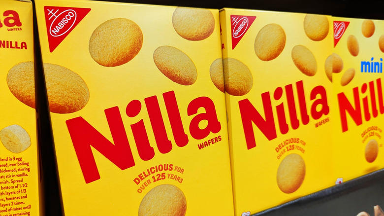 Two boxes of Nilla Wafers next to a box of mini Nilla Wafers on a shelf.