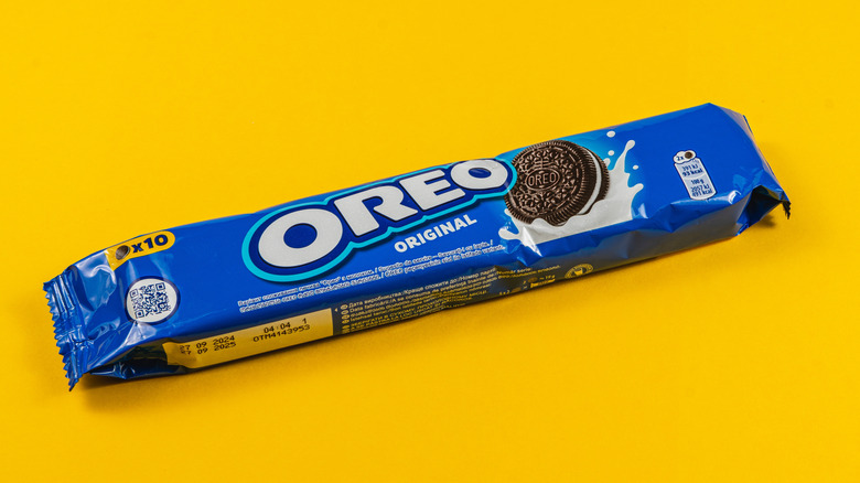 A package of original Oreo cookies on a yellow surface