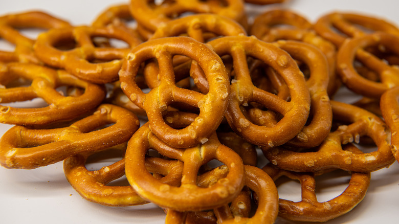 pile of pretzels on white background