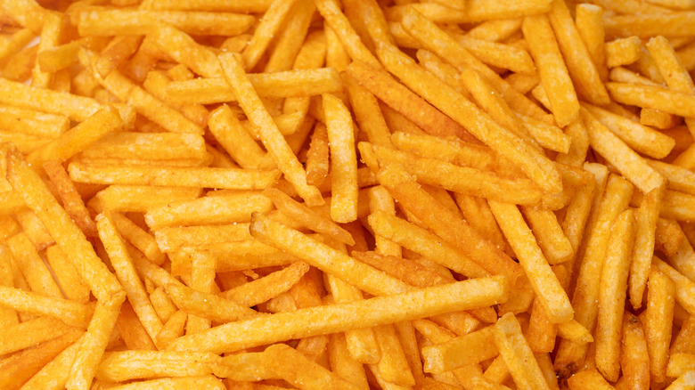 Golden french fries in a heap