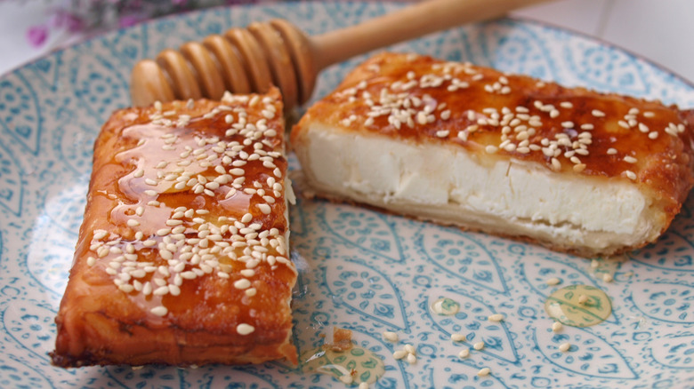 Baked feta wrapped in phyllo with honey and sesame seeds