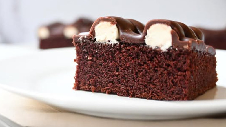 A square of bumpy cake on a white plate
